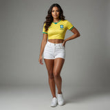 MAILLOT BRÉSIL CROP TOP FEMME DOMICILE 2026/2027