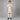 Enfant portant le kit Naples extérieur 2025/2026 : maillot, short et chaussettes